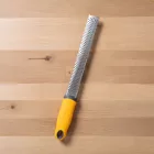 Kézi reszelő, sárga nyéllel